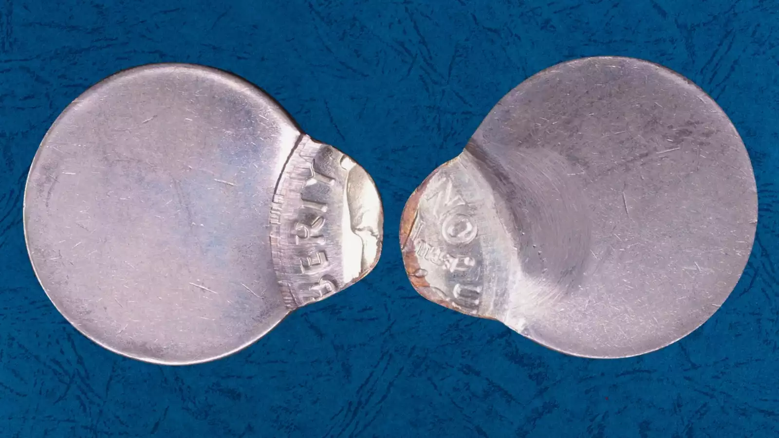 2015 Roosevelt dime off-center strike error showing design shifted from center with blank planchet visible